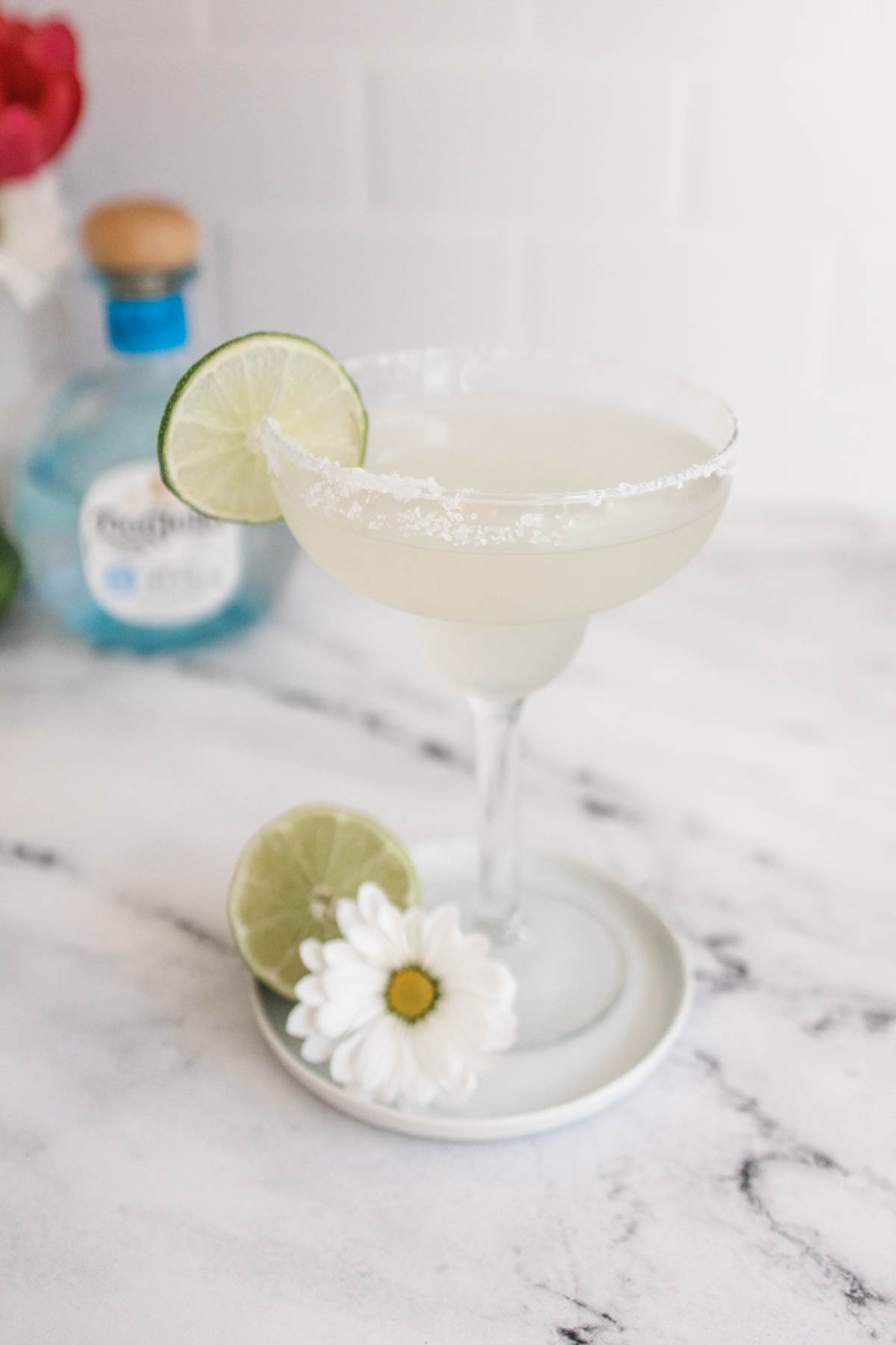 A classic margarita with 3 ingredients in a margarita glass.