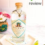 A bottle of clear Mayenda tequila on top of a white plate with a caption "Mayenda Tequila review."
