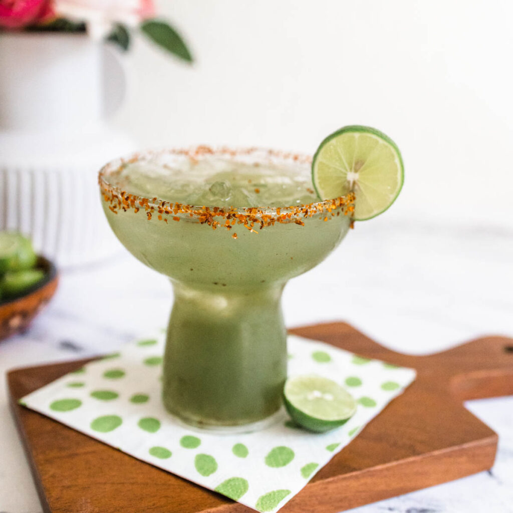 Green Margaritas for St. Patrick's Day with a Tajin rim.