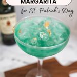 Text: Irish Margarita for St. Patrick's Day with a green glitter margarita with edible gold leaf garnish.